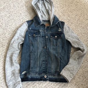 Jean jacket with gray sleeves and hood